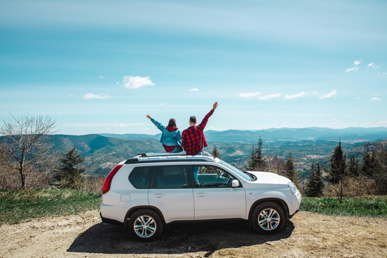 A couple with their car